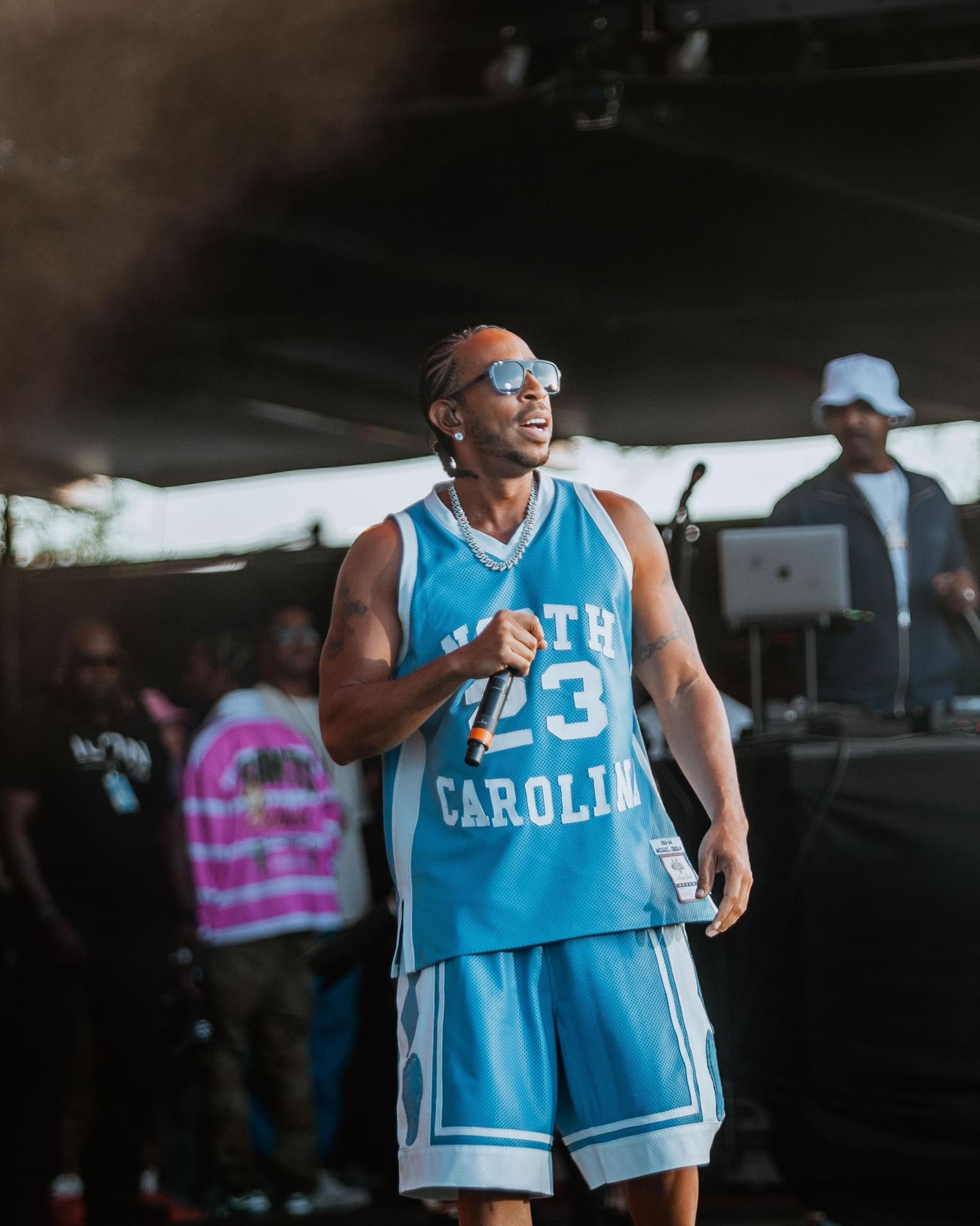 Ludacris smiles on stage at Dreamville Festival, Raleigh, April 2025