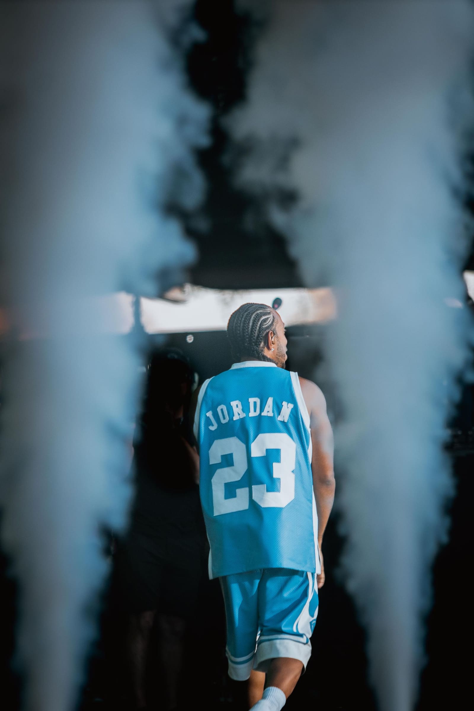 Ludacris walks through stage smoke at Dreamville Festival, Raleigh, 2025