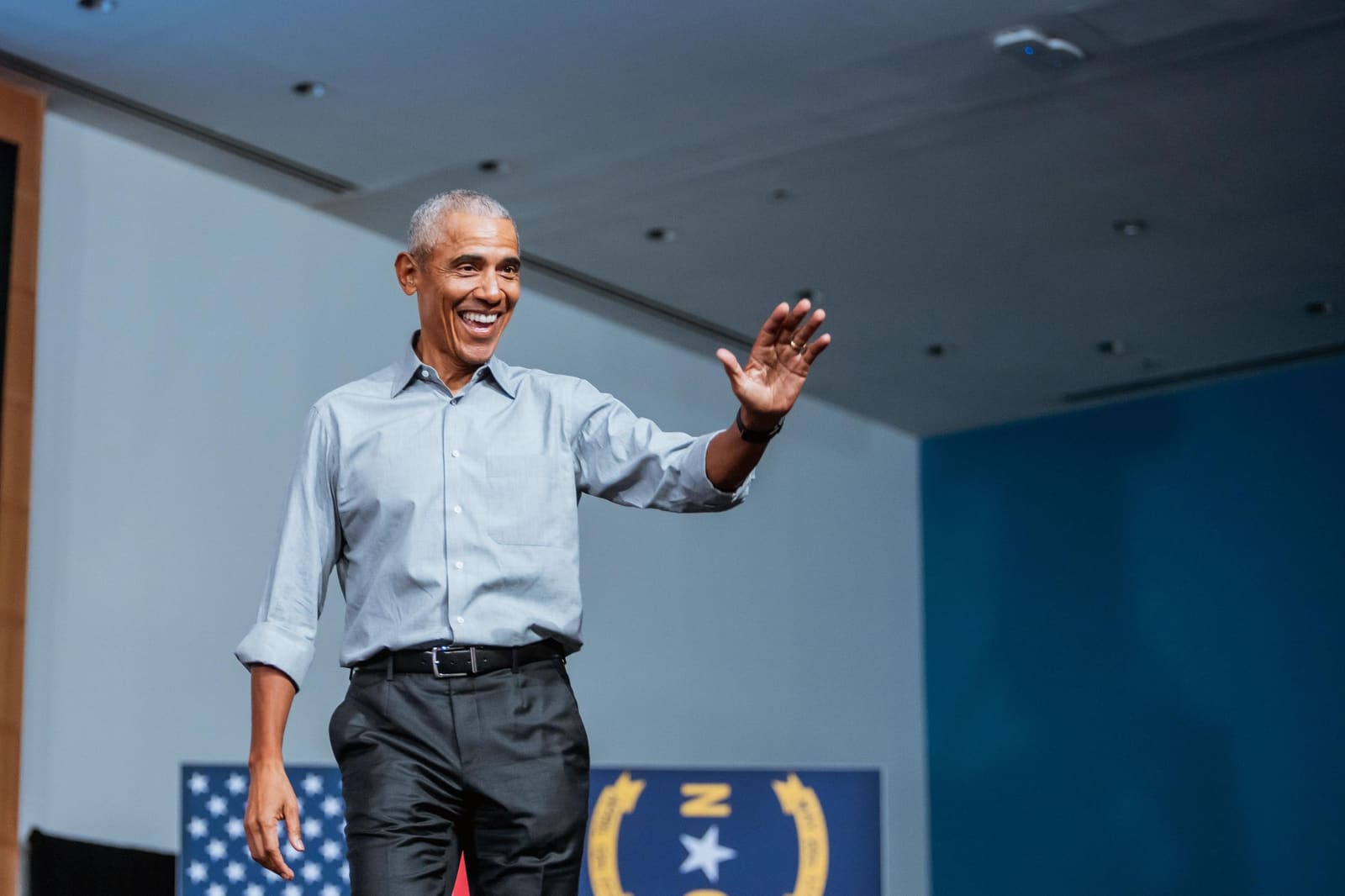 Barack Obama waves to the crowd as he walks on stage in Charlotte, NC
