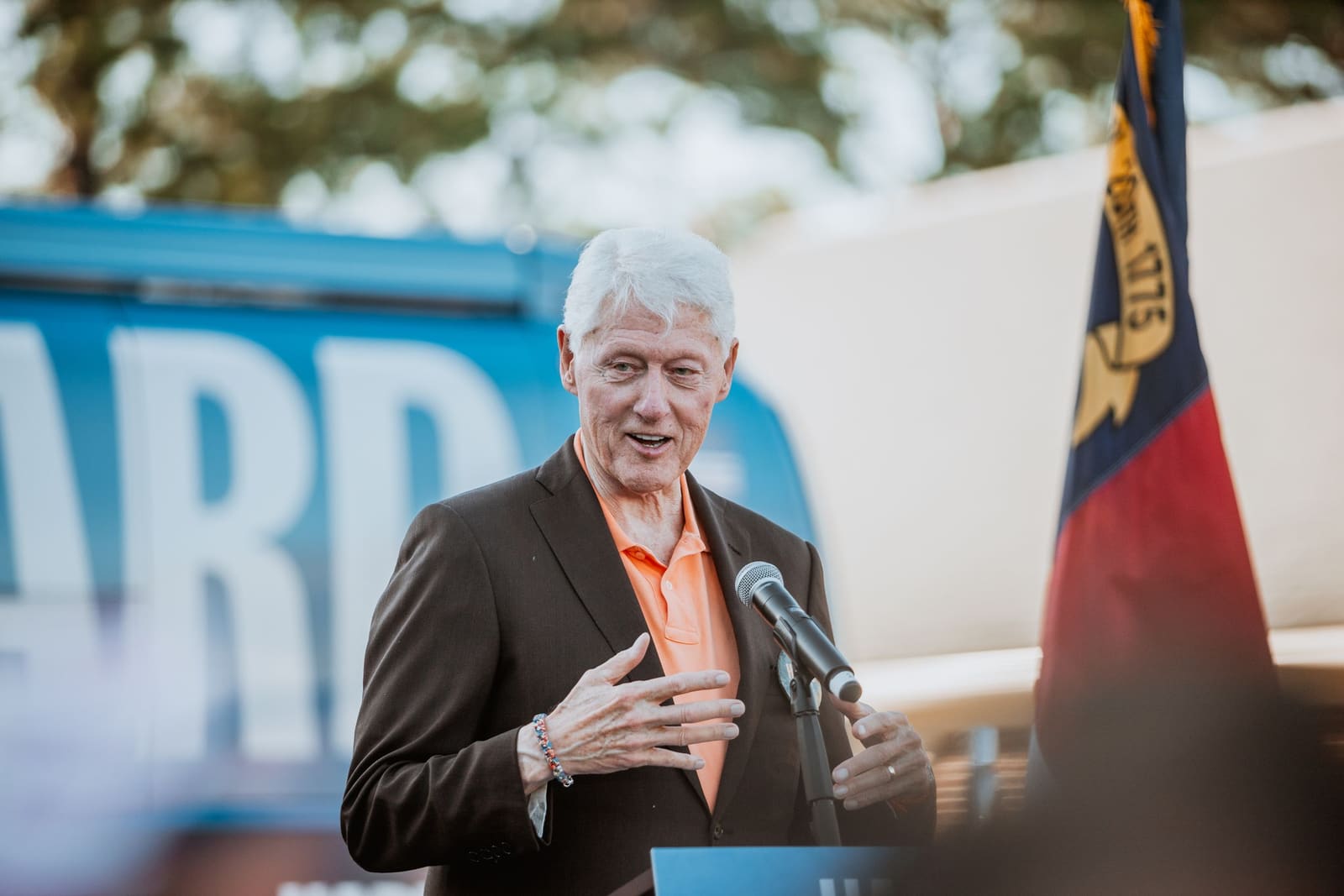 Bill Clinton speaks at an outdoor Harris campaign rally in Greenville, NC