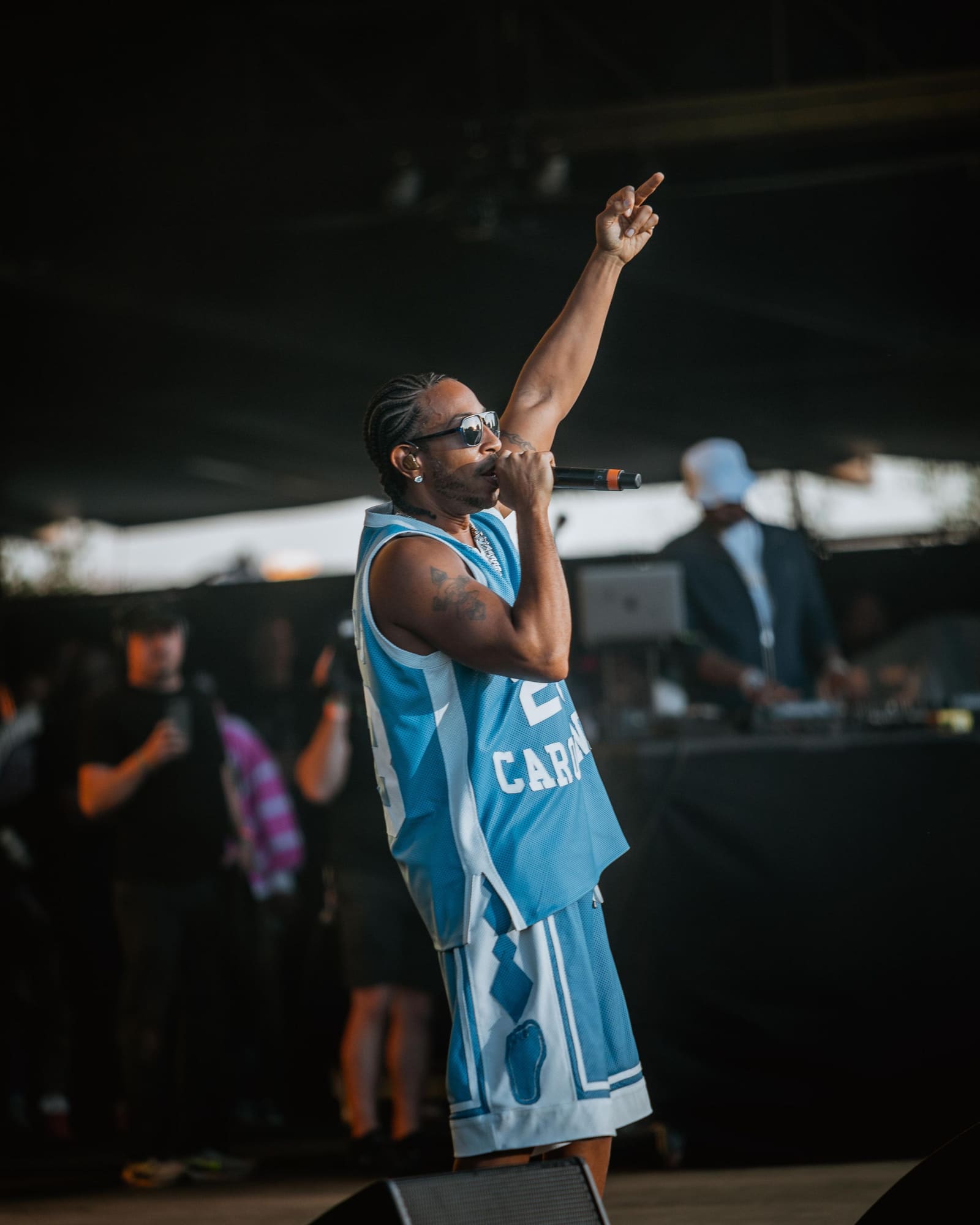 Ludacris raises a hand during his Dreamville Festival set, Raleigh