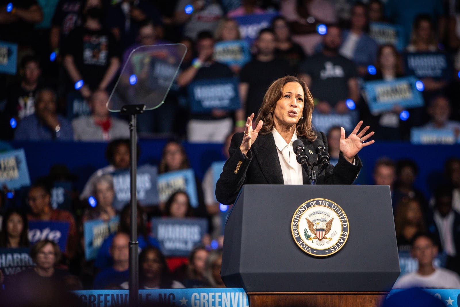 Kamala Harris gestures while speaking at Minges Coliseum, Greenville, NC
