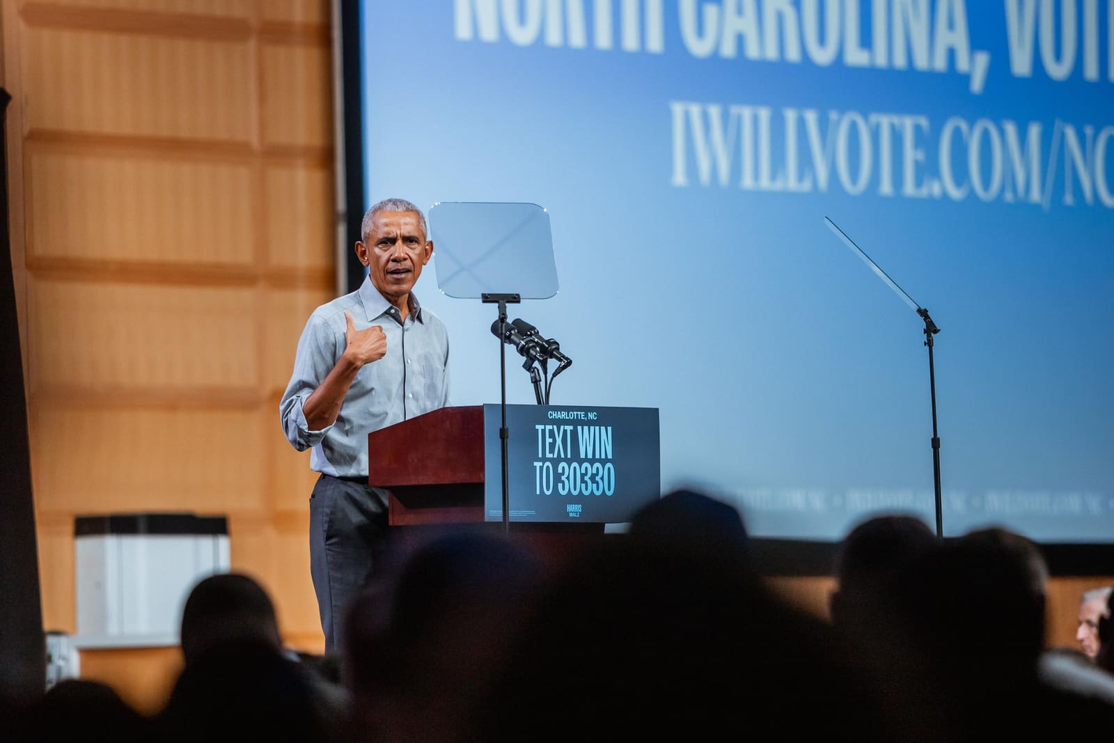 Barack Obama at the podium under an I Will Vote sign in Charlotte, NC