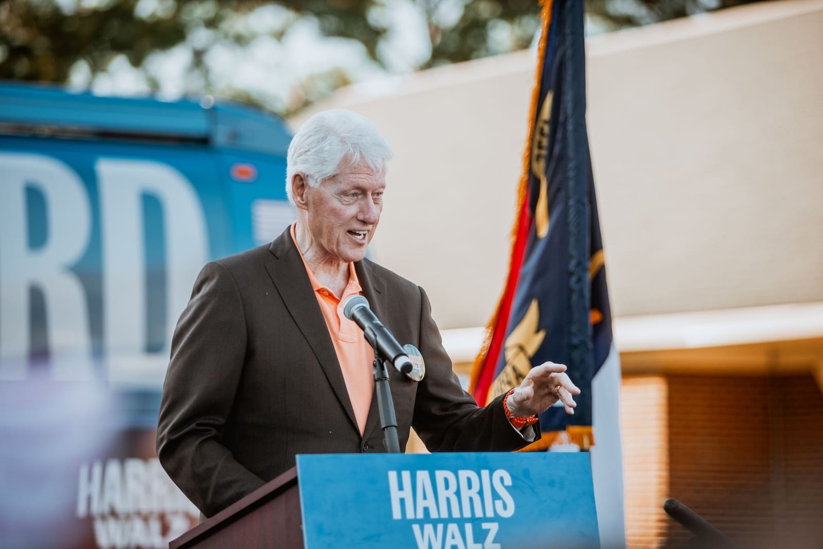 Bill Clinton speaks at an outdoor podium, Greenville, NC