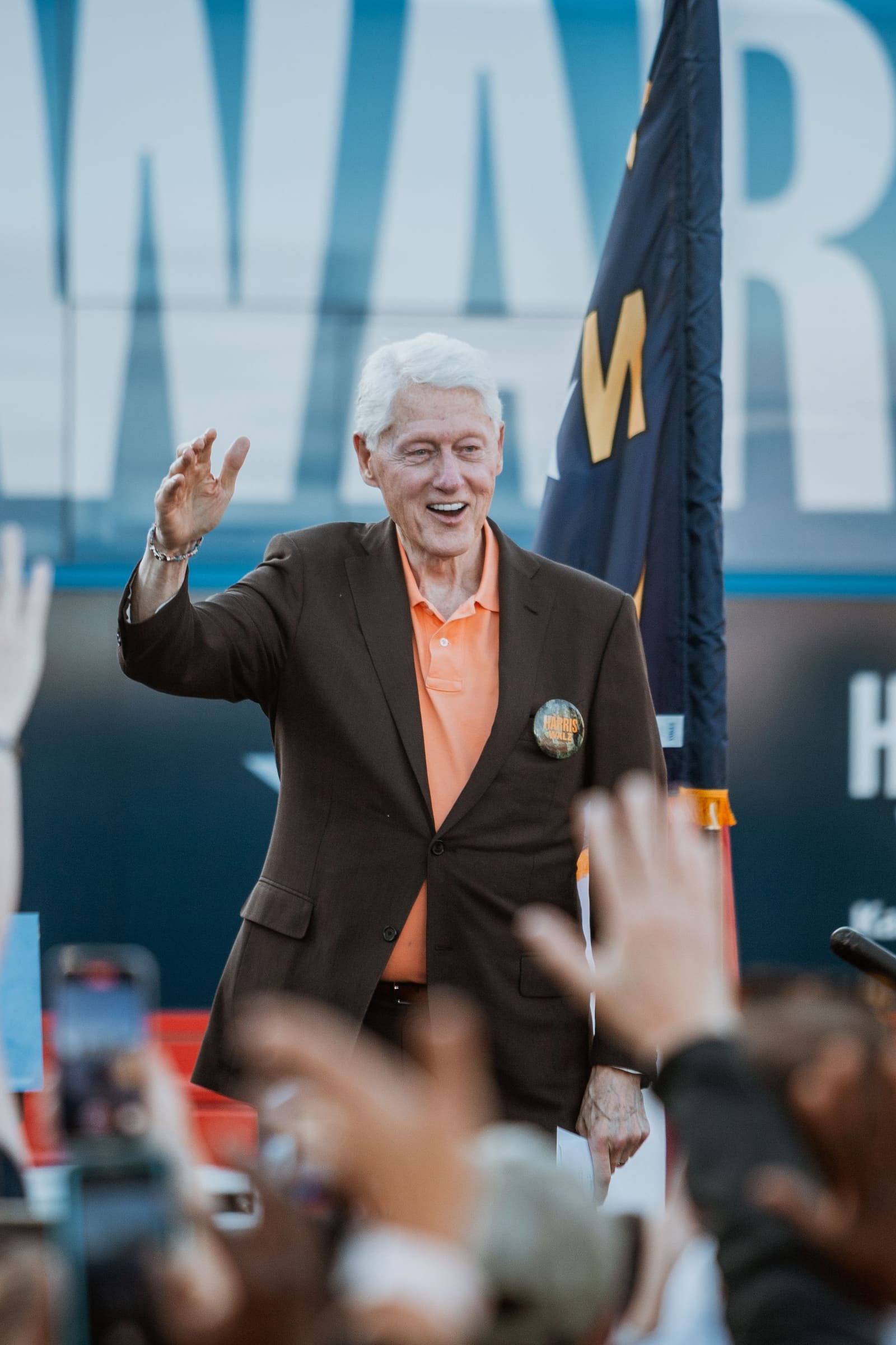 Bill Clinton waves to the crowd in Greenville, NC