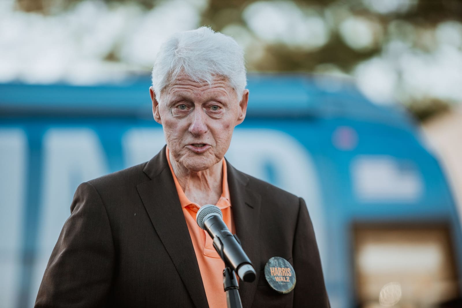 Bill Clinton at the microphone outdoors, Greenville, NC