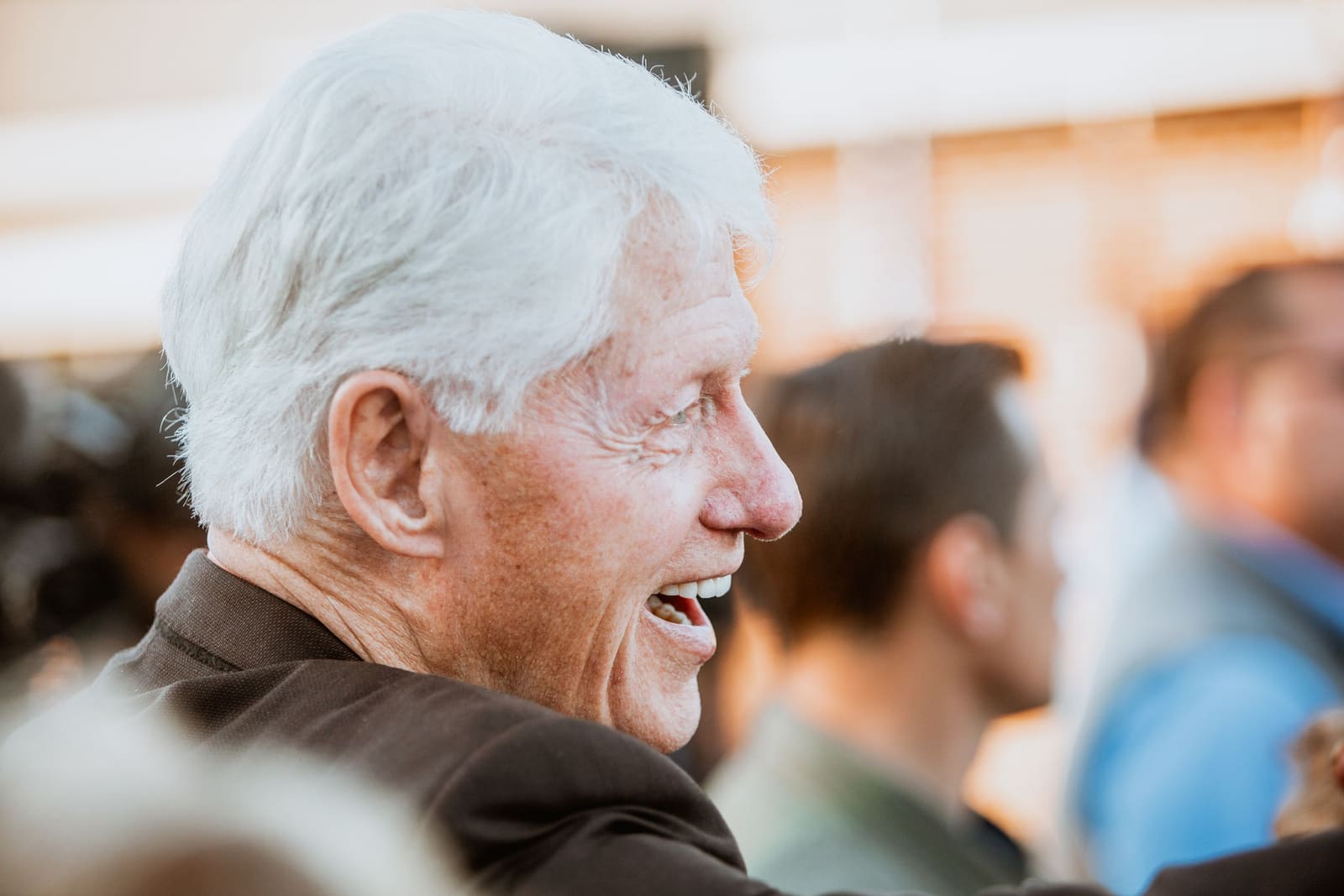 Bill Clinton laughs in profile at a Greenville, NC rally