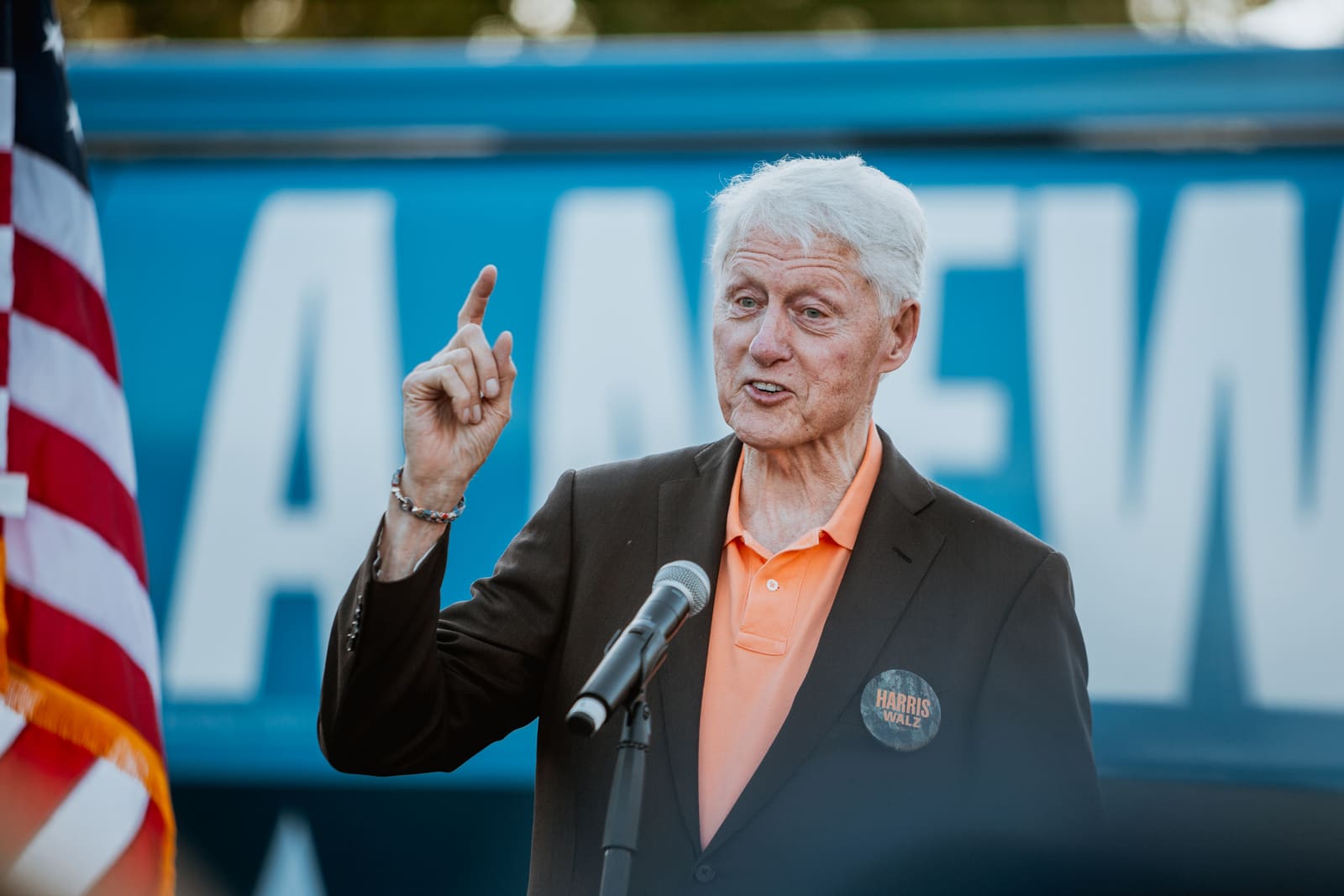 Bill Clinton raises a finger to make a point