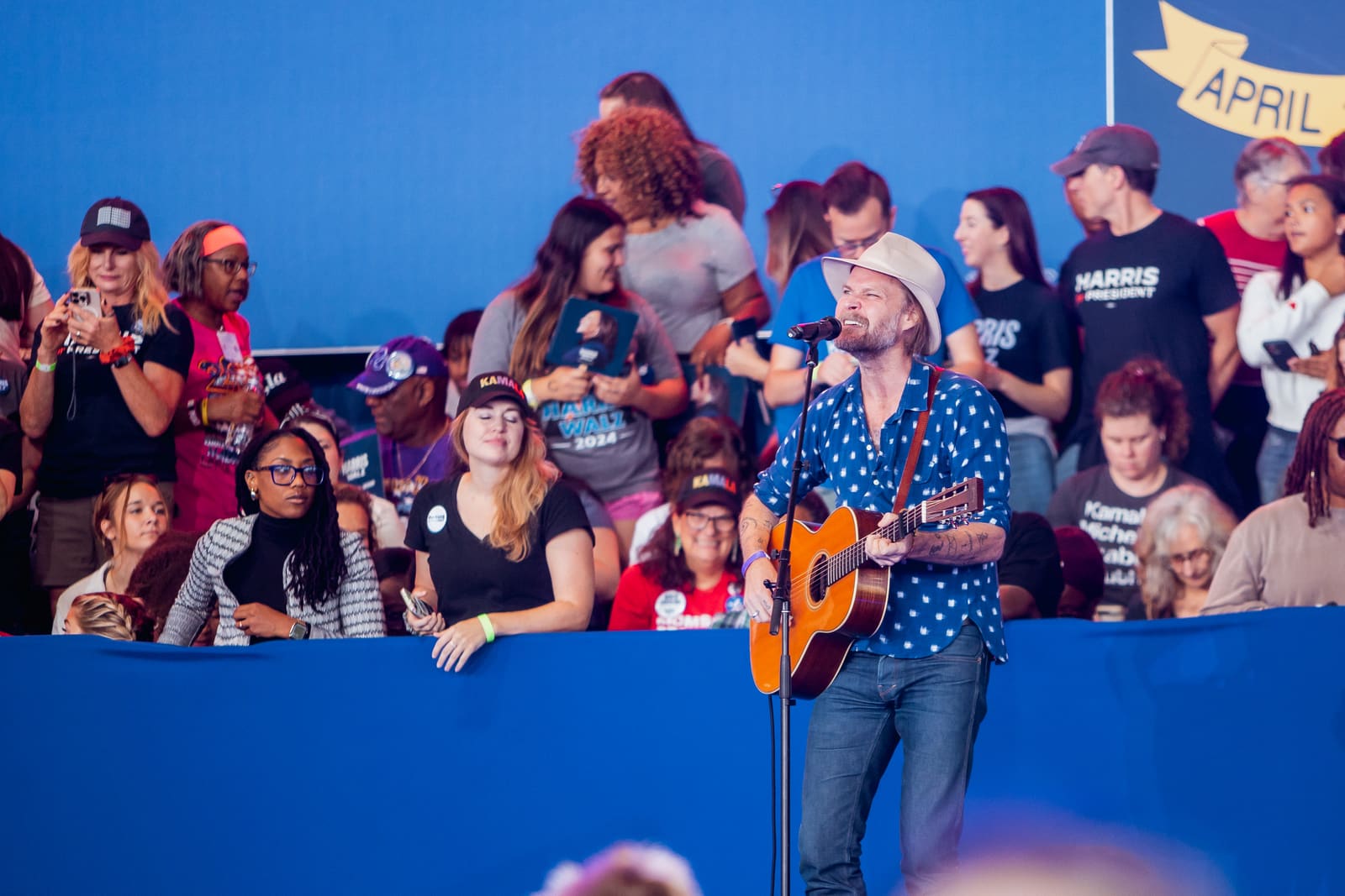 Guitarist performing before the rally