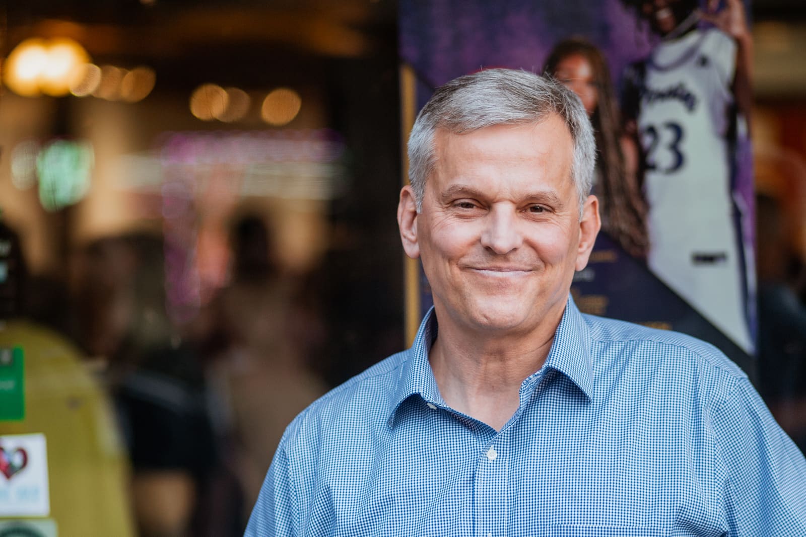 Josh Stein smiling at the camera