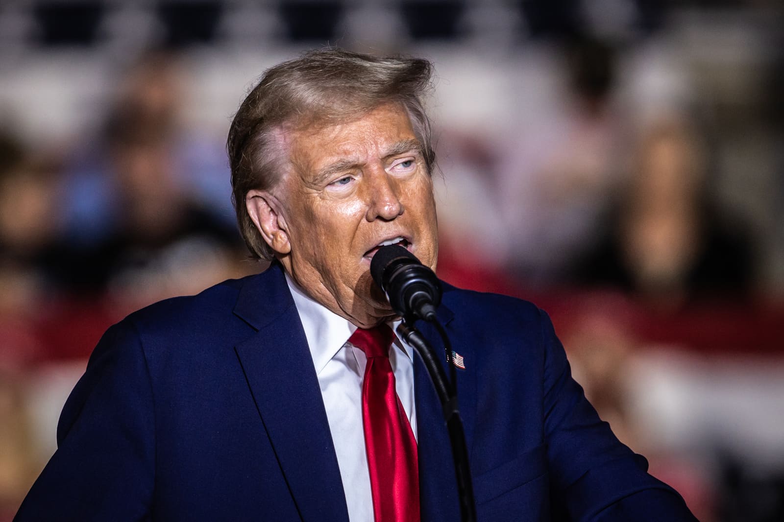 Donald Trump in tight profile at the microphone