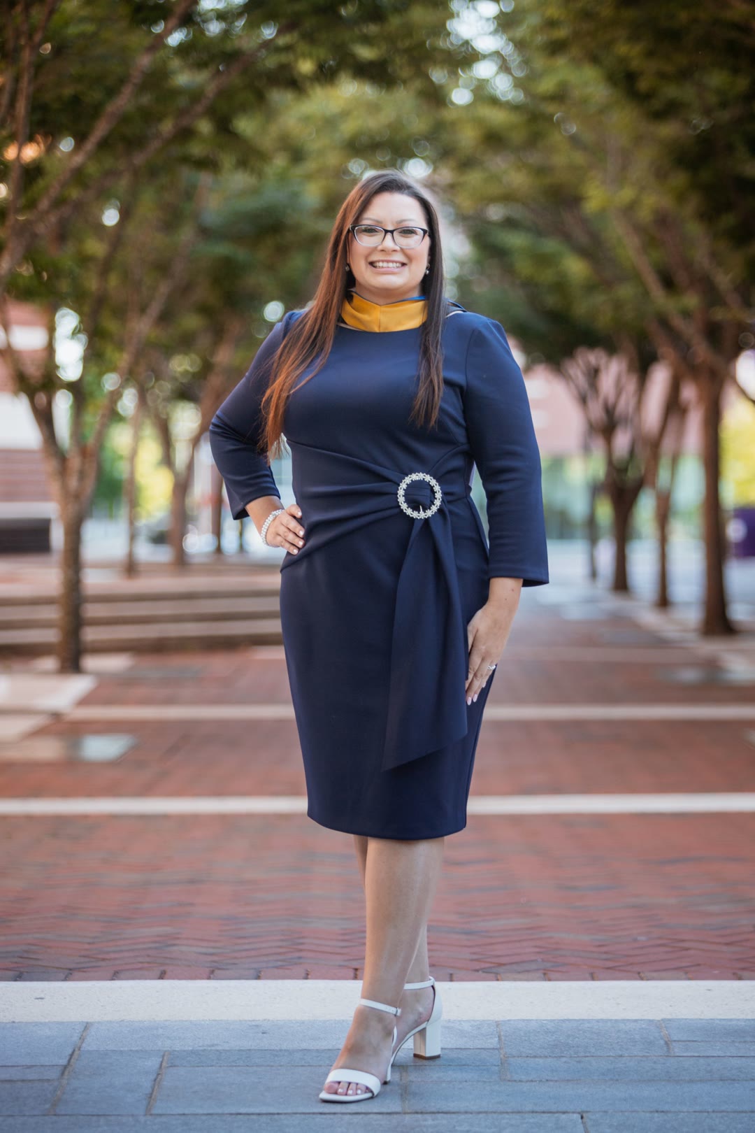 Professional portrait on a brick walkway